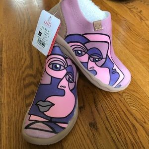 These are Walk of Art by UIN.  Sells for $85 on Amazon. Knitted Scotch guard